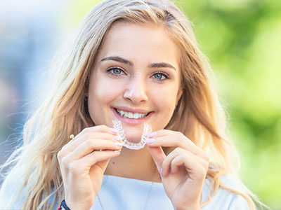 Albee Dental Care | Sports Mouthguards, Invisalign reg  and Oral Cancer Screening
